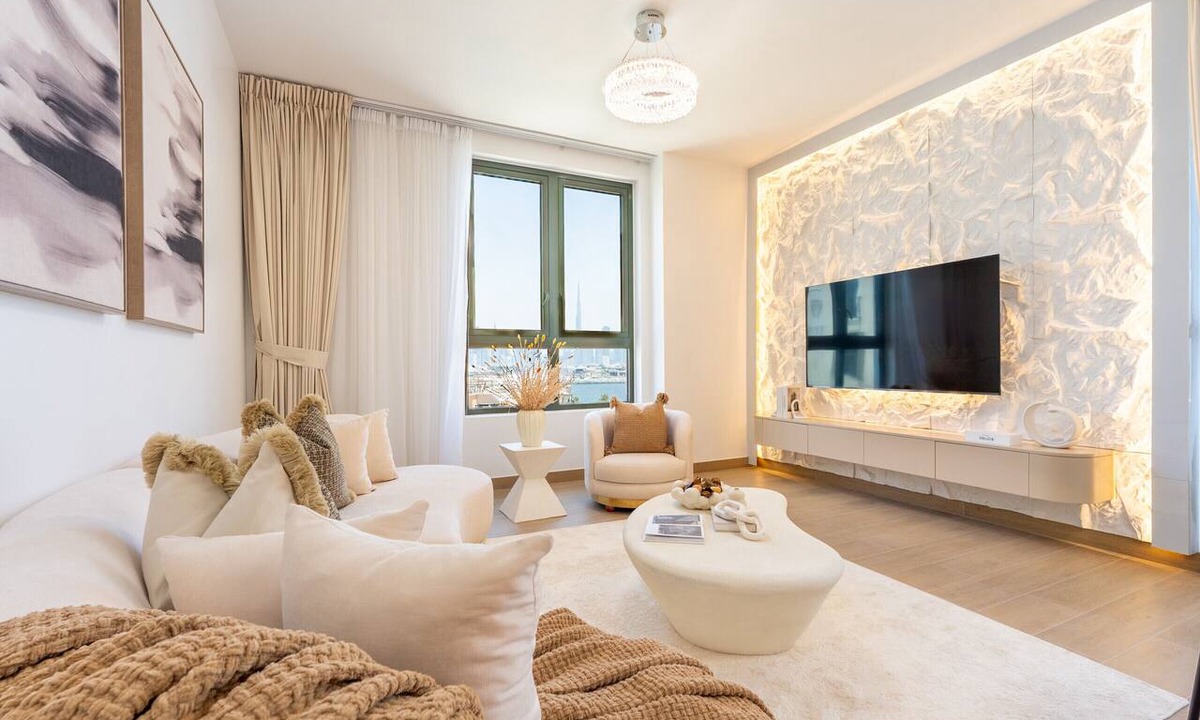 Dubai Apartment | Balcony Facing the Sea with Burj Khalifa Glimpses from the Living to Bedrooms