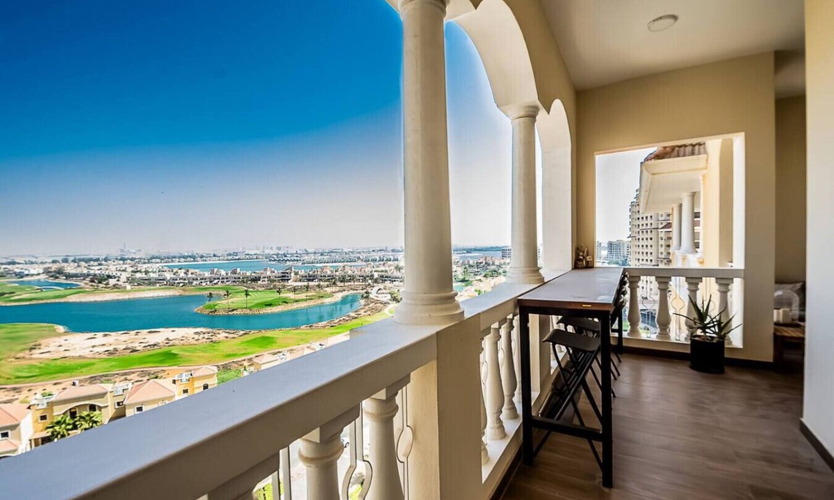 Al Hamra Village Apartment | Serene Lagoon Escape