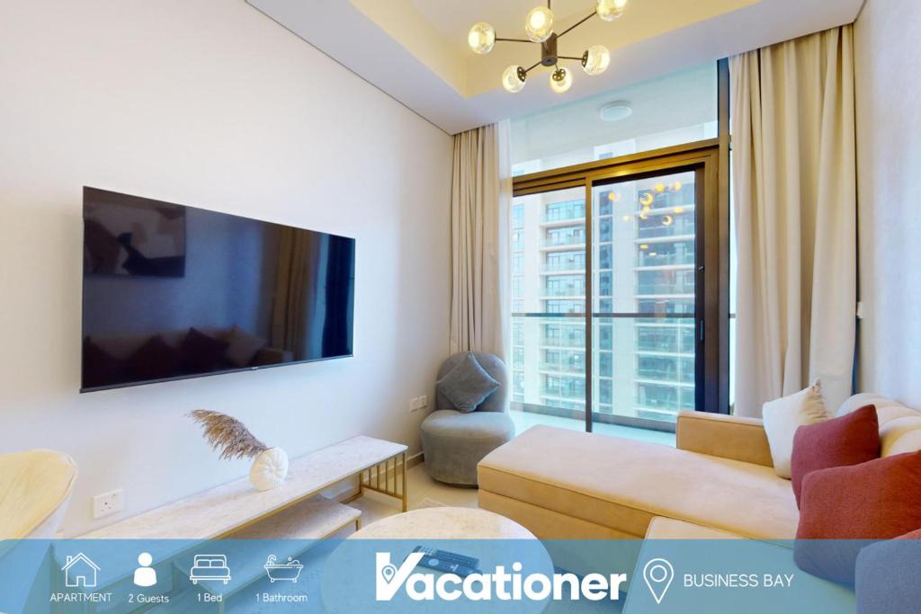 Sheikh Zayed Road Apartment | Vacationer Holiday Homes I Calm 1 Bed l Free Parking, Wi-Fi & Pool Access l Business Bay