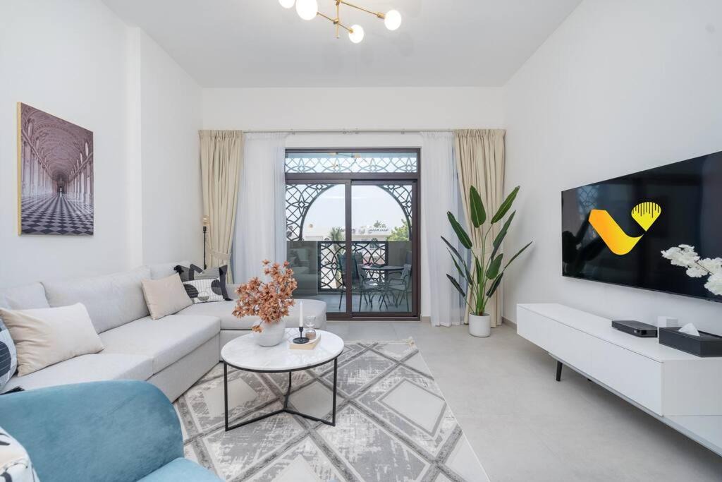 Umm Suqeim 3 Apartment | Vogue Vacation Homes, Madinat Jumeirah Living Rahaal Near Burj Al Arab One Bedroom Apartment with Balcony and Vibrant Community View, Access to all Amenities