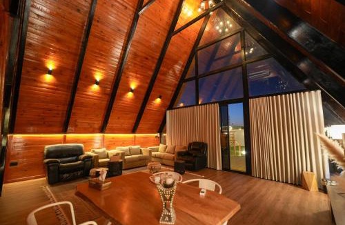 Remah Apartment | A-Frame Farm Retreat Abu Dhabi 2BR Cabin