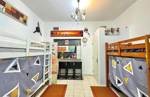 Barsha Heights Apartment | Bed in mixed room