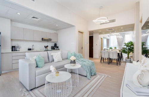 Dubai Production City Apartment | Bright and Modern 1BR Midtown Near Expo Site by Vibel