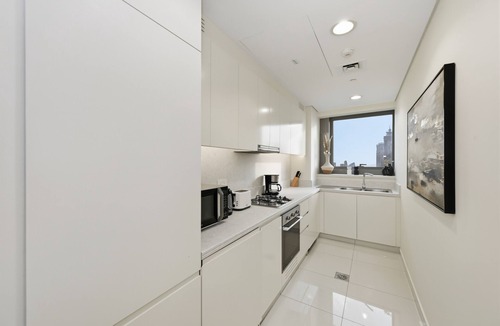 Downtown Dubai Apartment | Burj & Sea Views |Luxury 2BR| 5-Star Amenities + Concierge services