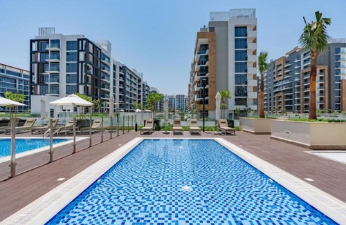 Dubai Apartment | Community View Studio with Balcony, Azizi Riviera 24