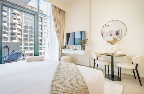 Dubai Apartment | Community View Studio with Balcony, Azizi Riviera 24