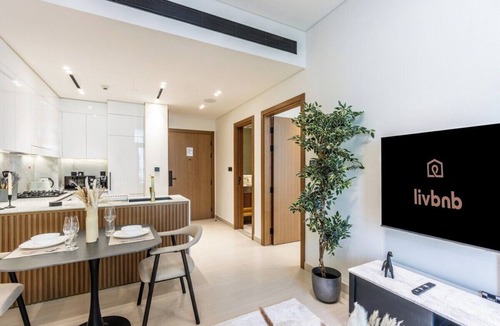 Jumeirah Village Circle Apartment | Elegant 1BR with Balcony & Skyline Views