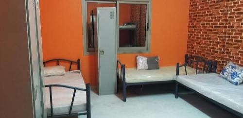 Abu Shagara Hostel | Executive Sharing Bed With Other Male Guests