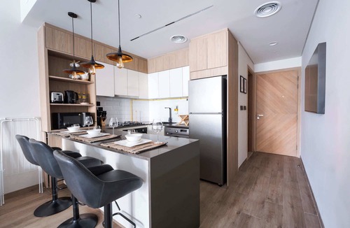 Jumeirah Village Circle Apartment | Free housekeeping visits during your stay - StayShort - JVC Apartment with Private Balcony Sleeps 4