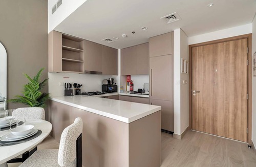 Nad Al Sheba Apartment | Free housekeeping visits during your stay - StayShort - Chic Modern 1BR that Sleeps 4 at Riviera Beachfront