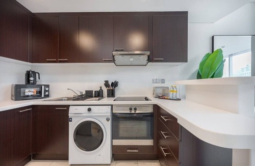 Bur Dubai Apartment | Free housekeeping visits during your stay - StayShort - Sky Gardens Studio with Skyscraper Views in DIFC!