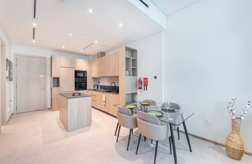 Jumeirah Village Circle Apartment | JVC-Signature Livings 103 N · Modern flat with KING SIZE bed and HIGH SPEED Wifi
