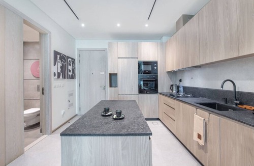 Jumeirah Village Circle Apartment | JVC-Signature Livings 103 N · Modern flat with KING SIZE bed and HIGH SPEED Wifi