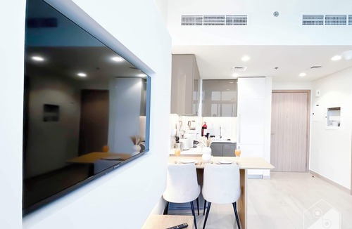 Nad Al Sheba Apartment | Luxury 1BR with Balcony in Azizi Riviera