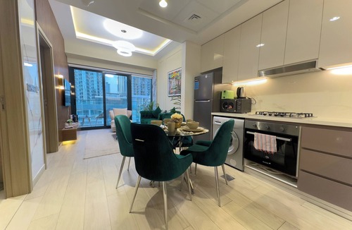 Nad Al Sheba Apartment | Meydan Luxury: Stylish 1BR with Pool & Canal Views-612