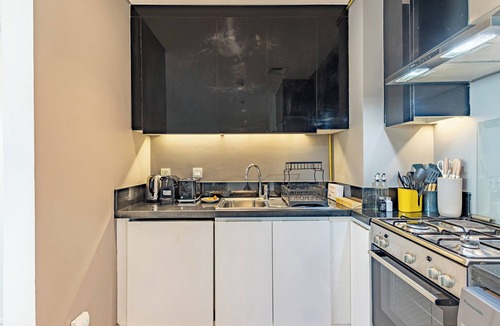 Business Bay Apartment | Modern Business Bay 1BR | Balcony and Pool Views