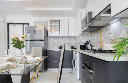 Discovery Gardens Apartment | Pearlz by Danube
