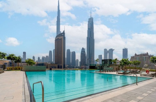 Bur Dubai Apartment | Prime Location Full Burj View 2 min to Dubai Mall