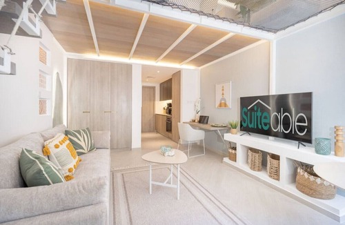 Jumeirah Village Circle Apartment | Relax & Recharge Studio Loft with hanging net