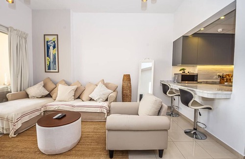 Al Hamra Village Apartment | Serene Lagoon Escape