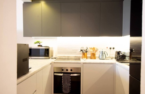 Al Hamra Village Apartment | Serene Lagoon Escape