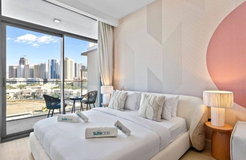 Jumeirah Village Circle Apartment | Sun-Kissed Studio with Warm Terracotta Details