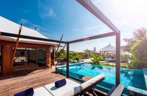Al Hamra Village Resort | The Ritz-Carlton Ras Al Khaimah, Al Hamra Beach