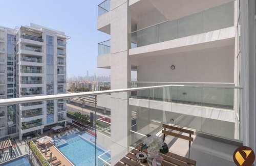 Discovery Gardens Apartment | Vogue Vacation Homes, Al Furjan Pearlz by Danube near Ibn Battuta Mall, One Bedroom Apartment with Balcony and vibrant community view, Access to all Amenities, Walkable to Al Furjan Metro Station
