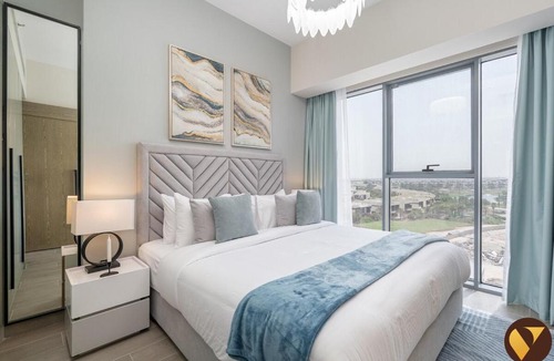 Dubai Apartment | Vogue Vacation Homes, Damac Hills Golf Gate near First Avenue Mall, Two Bedroom Apartment with Balcony and Vibrant Community View, Access to all Amenities
