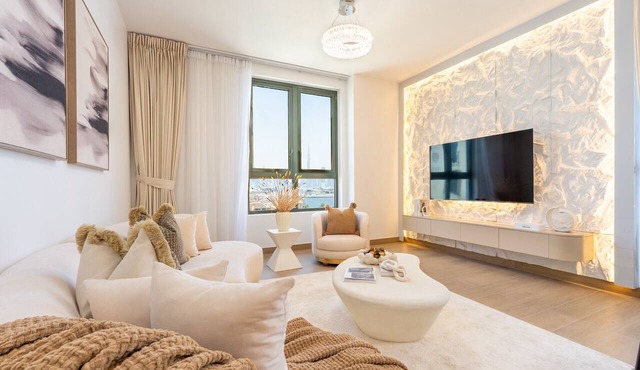 Balcony Facing the Sea with Burj Khalifa Glimpses from the Living to Bedrooms
