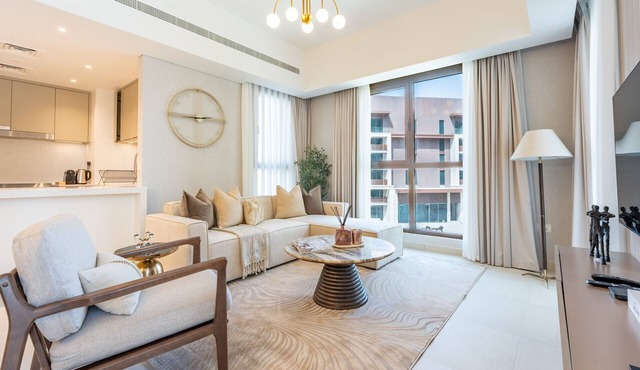 Chic 2BR Retreat with Assistant Room, Short Minutes Drive to MOE and the Beach