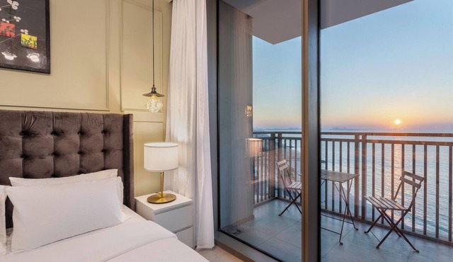 Luxury Living by the Marina Enjoy 2BR Comfort with Iconic Ferris Wheel Views