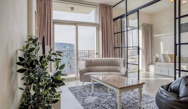 Pool & Balcony Apartment in Vibrant Dubai Locale