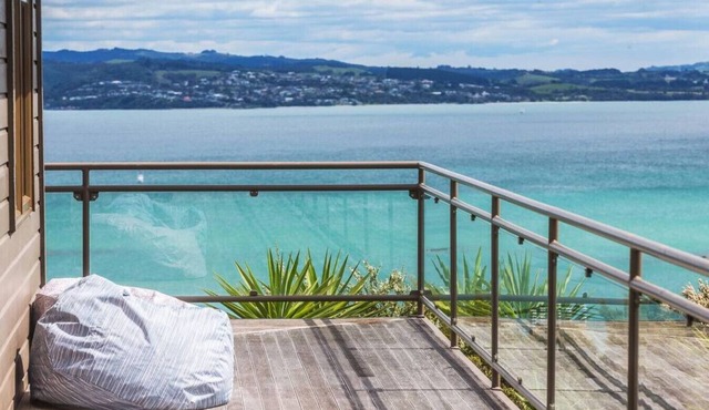 Sea views and sublime sunsets from the spa in Auckland