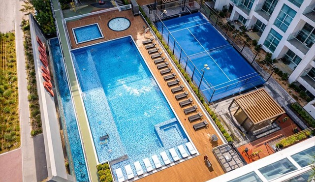 Vogue Vacation Homes, Al Furjan Pearlz by Danube near Ibn Battuta Mall, One Bedroom Apartment with Balcony and vibrant community view, Access to all Amenities, Walkable to Al Furjan Metro Station