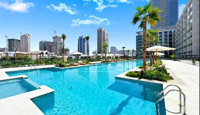 Vogue Vacation Homes, JVC Binghatti Phoenix near Circle Mall, One Bedroom Apartment with Balcony and Access to all Amenities