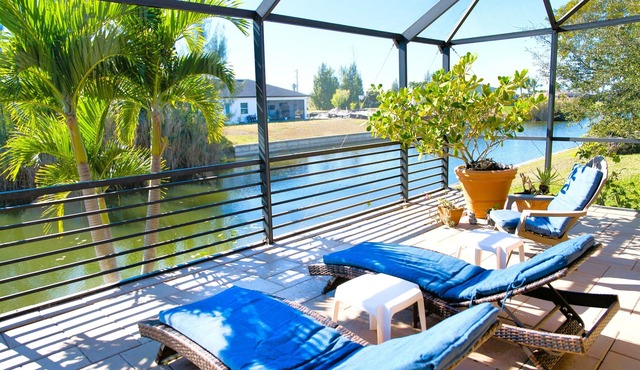 Waterfront home with oversized heated pool & spa, bikes, beach gear! in Cape Coral