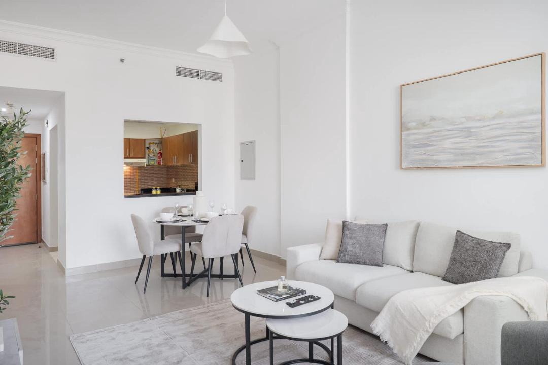 Jumeirah Village Circle Apartment | Free housekeeping visits during your stay - StayShort - Chic 1BR JVC Hideaway - Pool Access and Sleeps 4