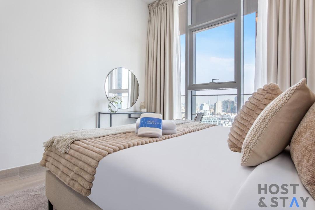 Jumeirah Village Circle House | Elegant 1BR at Bloom - Host & Stay