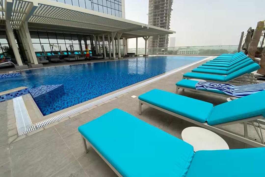 Jumeirah Village Triangle Apartment | Vogue Vacation Homes, Novotel Residences JVT near Springs Souk Mall, Studio Apartment with Balcony and City View, Access to all Amenities