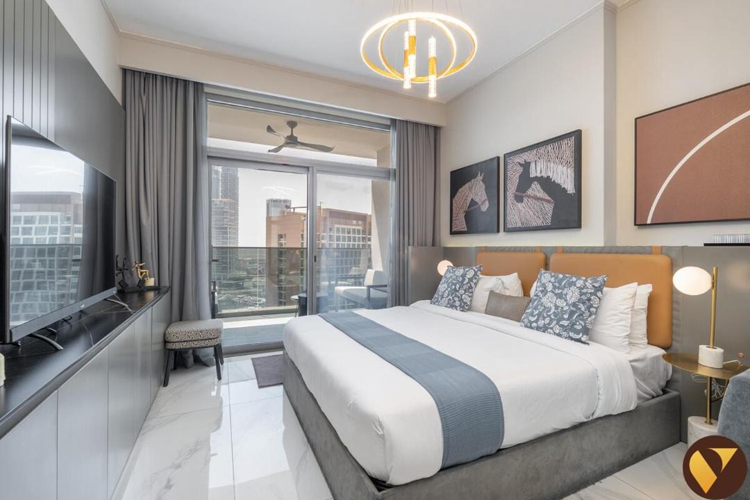 Madinat Zayed Apartment | Vogue Vacation Homes, Downtown Mag318 near Burj Khalifa and Dubai Mall, Studio Apartment with Balcony, Canal and City View, Access to all Amenities