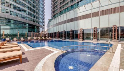 One-Bedroom Apartment with Balcony and City View