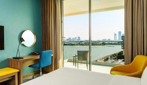 Aloft Partial Sea View King Room with Balcony including 20% off F&B, Spa & Abra Boat Tour Discount 