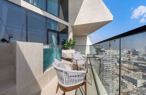 Madinat Zayed Apartment | Chic 1BR Retreat with Pool & Balcony JVC