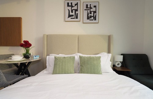 Jumeirah Village Circle Apartment | Modern Studio with Balcony Views of FIVE Hotels