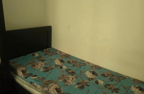 Sharjah Apartment | Bedroom with shared kitchen men only