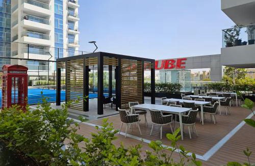 Discovery Gardens Apartment | Vogue Vacation Homes, Al Furjan Pearlz by Danube near Ibn Battuta Mall, One Bedroom Apartment with Terrace and vibrant community view, Access to all Amenities, Walkable to Al Furjan Metro Station