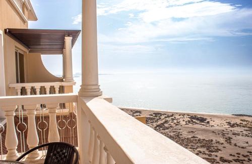 Al Hamra Village Apartment | Stylish Two-Bedroom Apartment Overlooking the Sea by Hala Homes