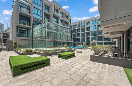 Jumeirah Village Circle Apartment | Sophisticated Studio Balcony, Pool & Gym JVC