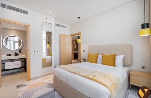 Jumeirah Village Triangle Apartment | Vogue Vacation Homes, Novotel Residences JVT near Springs Souk Mall, One Bedroom apartment with Balcony and Vibrant Community View, Access to all Amenities